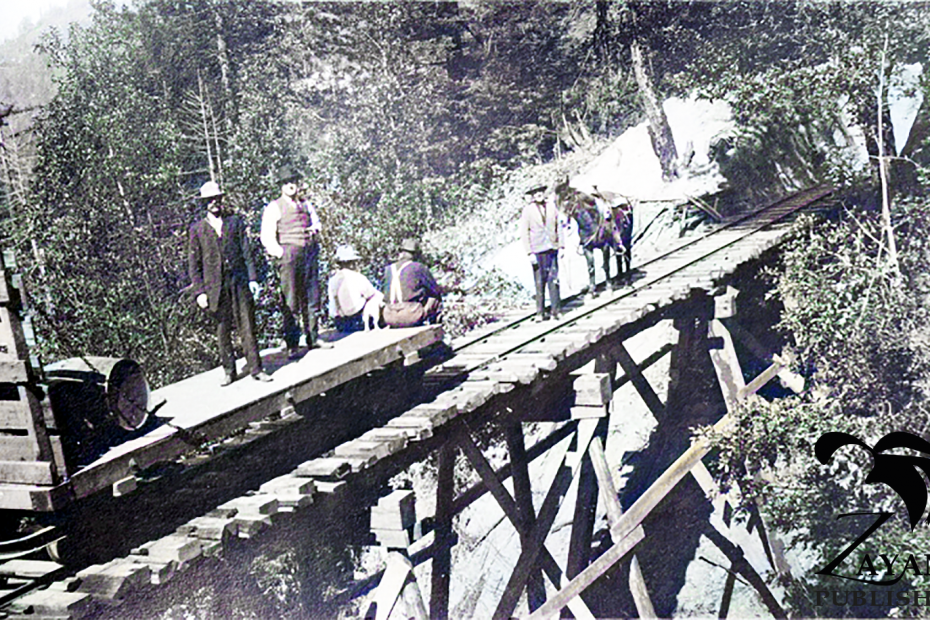 Molino Timber Company workers on a bridge above Hinckley Gulch